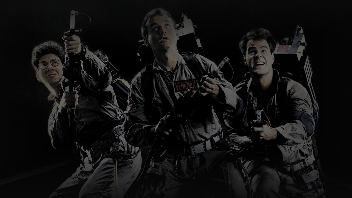 Still from Ghostbusters (1984) — 16:9 still from Letterboxd (the 1200x675 crop variant), baked through scripts/bake_dark_photo.py at default factor, mean brightness 28.1 (in canon range).